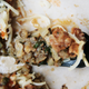 closeup of a forkful of cauliflower rice in chipotle burrito bowl